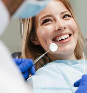 Patient in Jacksonville smiling after their Invisalign check-in